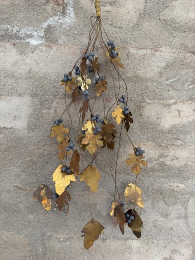 Mässingdetalj med små blad
